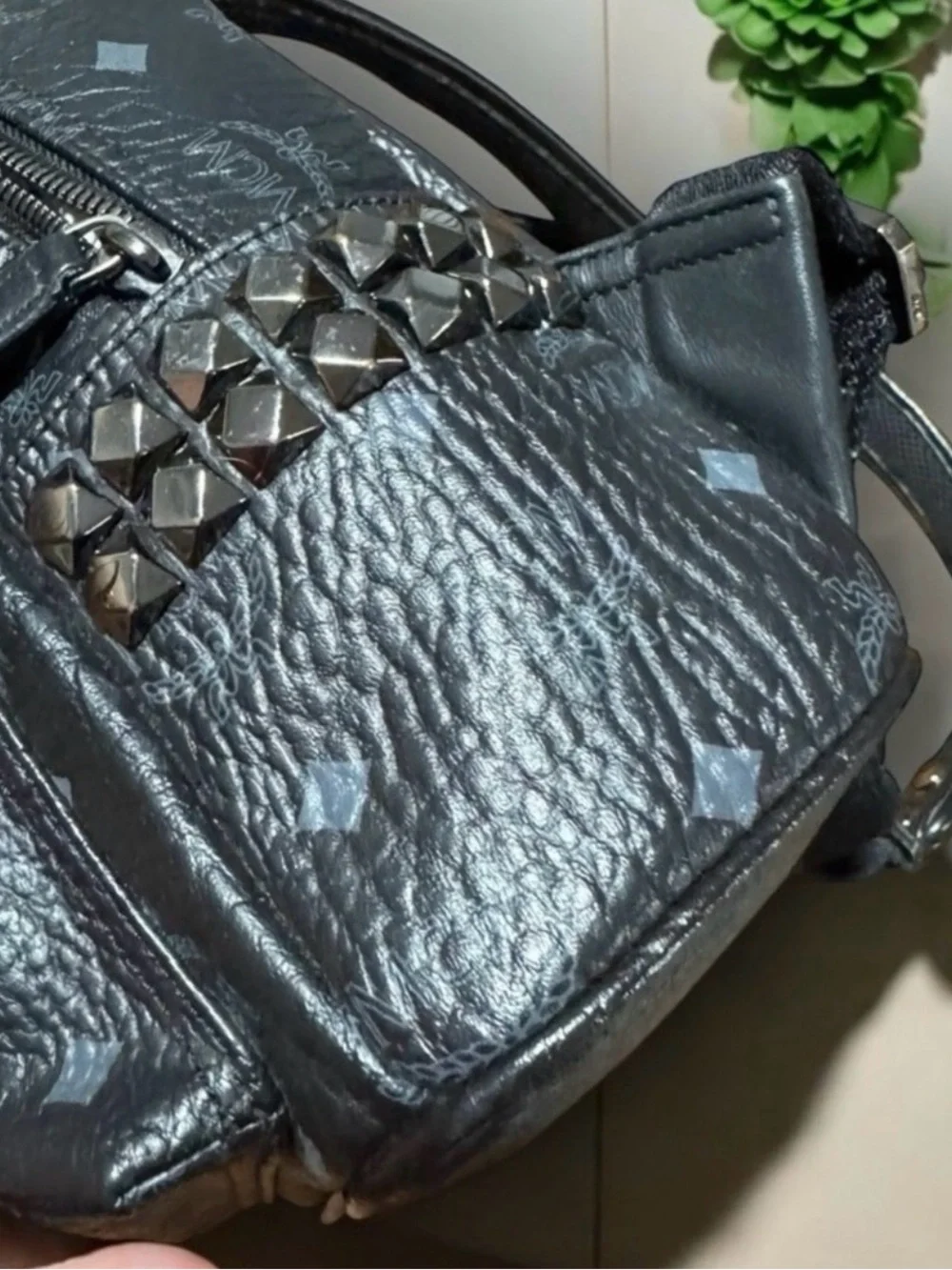 MCM Black Logo-Stamped Leather Mini Backpack with Stud Details